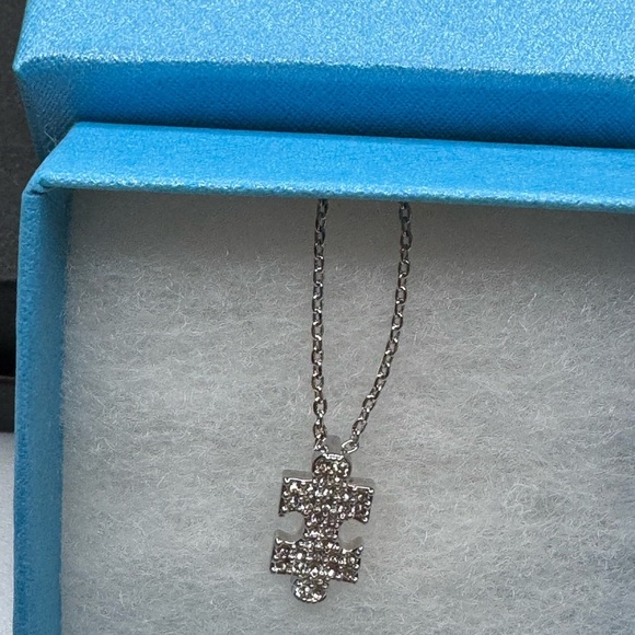 Touchstone Crystal Silver Puzzle Piece Necklace - Picture 2 of 3